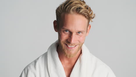 handsome blond man posing and smiling