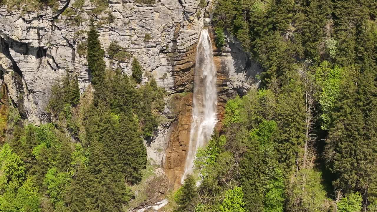 Seerenbachfälle waterfall in Betlis, Switzerland beautiful drone view, surrounded by lush alpine forest and rocky cliffs