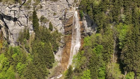seerenbachfälle waterfall in betlis, switzerland beautiful drone view, surrounded by lush alpine forest and rocky cliffs