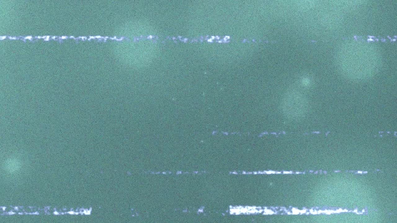 녹색 배경에 빛나는 반점 위의 장애 간섭의 애니메이션