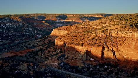 drone captures a stunning high-angle view of the canyonlands near kanab, utah, in the morning light.