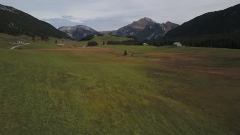 drone flying over green meadow of plateau des glières in haute-savoie, france