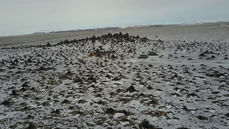 Lava-Ridge-at-Laufskálavarða-in-Iceland-Surrounded-by-Stone-Cairns