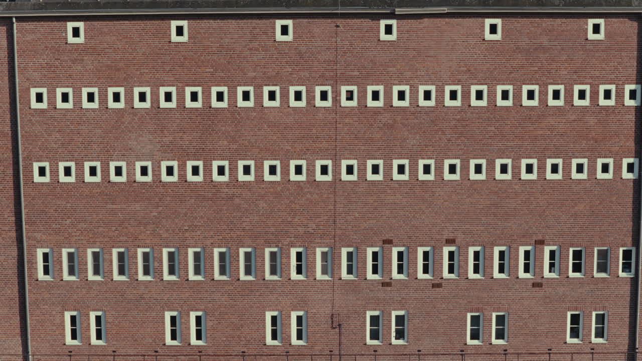 Brick Wall with Multiple Rows of Windows
