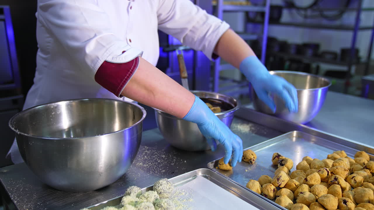 Woman Preparing Sweet Treats in a Commercial Kitchen