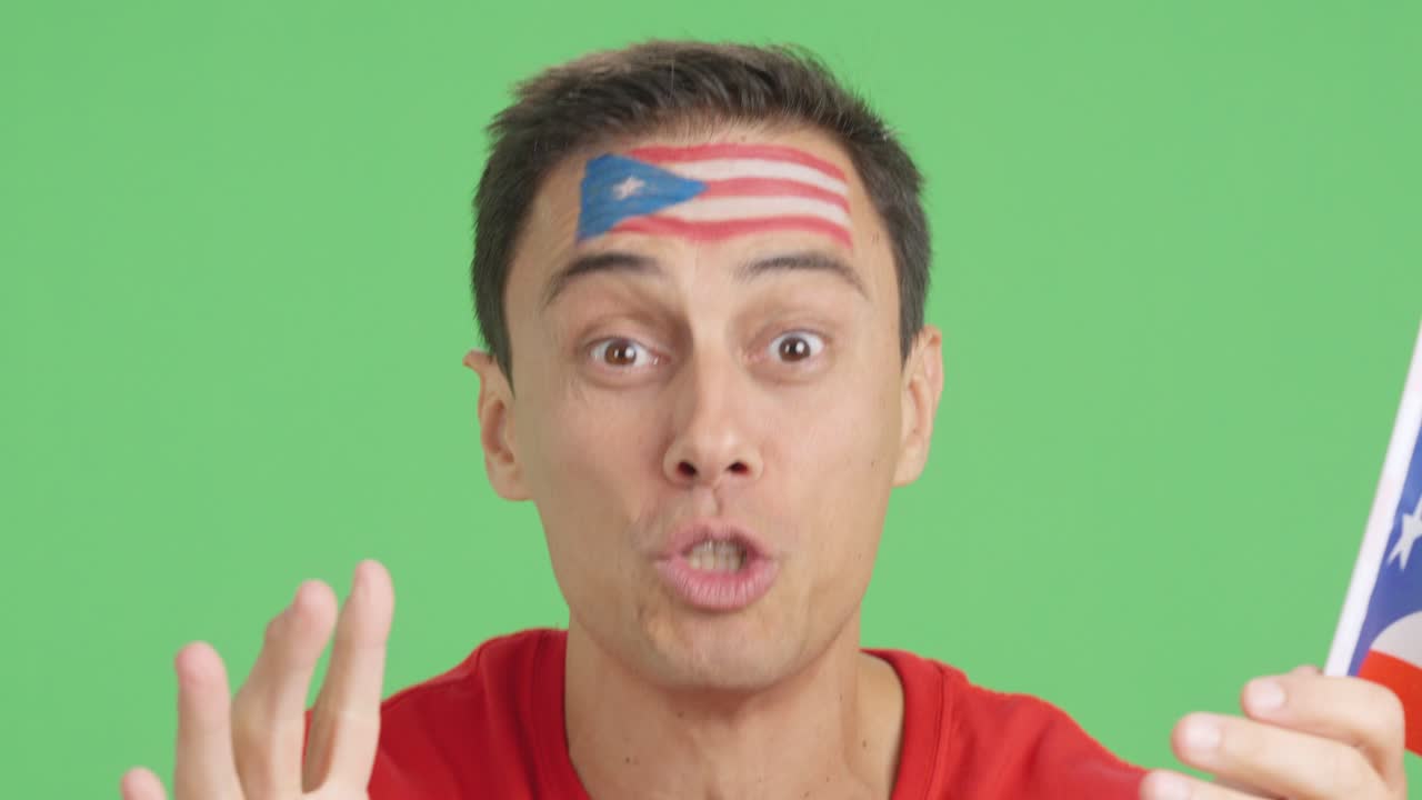 Close up of a man supporting puerto rican team