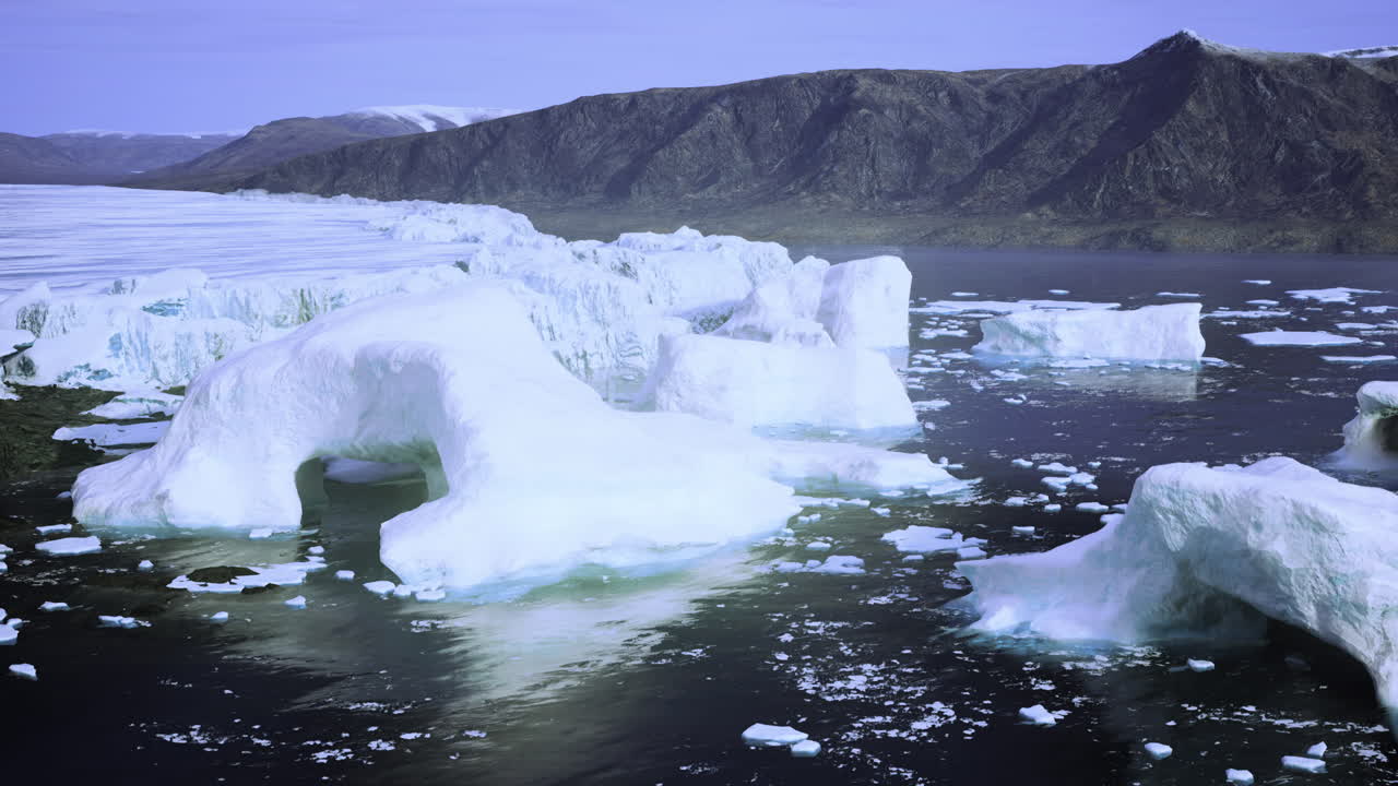 Icebergs floating in a serene arctic landscape during daylight hours