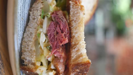 close-up of a corned beef sandwich