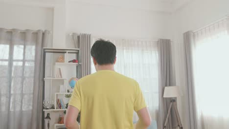 Man running in living room