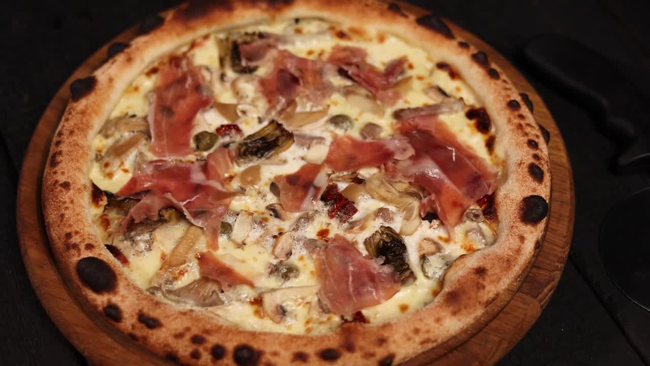 Gourmet Pizza with Prosciutto, Mushrooms, and Artichoke