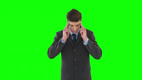 businessman getting a headache