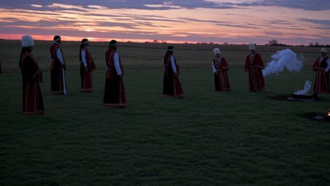 traditional cultural performance at sunset