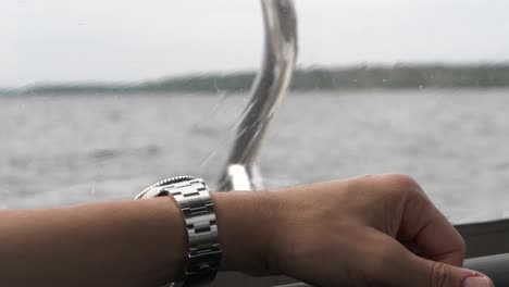 Exclusive-watch-on-mans-arm-resting-on-luxury-private-boat