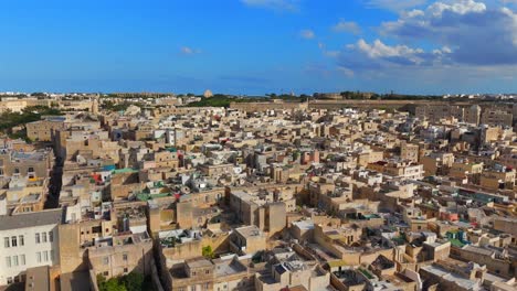 birgu’s blend of medieval and baroque architecture is beautifully highlighted from above, nestled between the sea and its towering walls.
