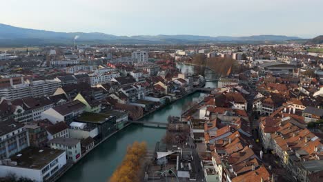 river aare dividing thun city in historic old town and modern center