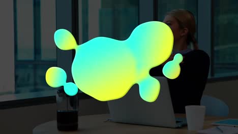 Animation-of-glowing-blob-over-businesswoman-stretching-in-office