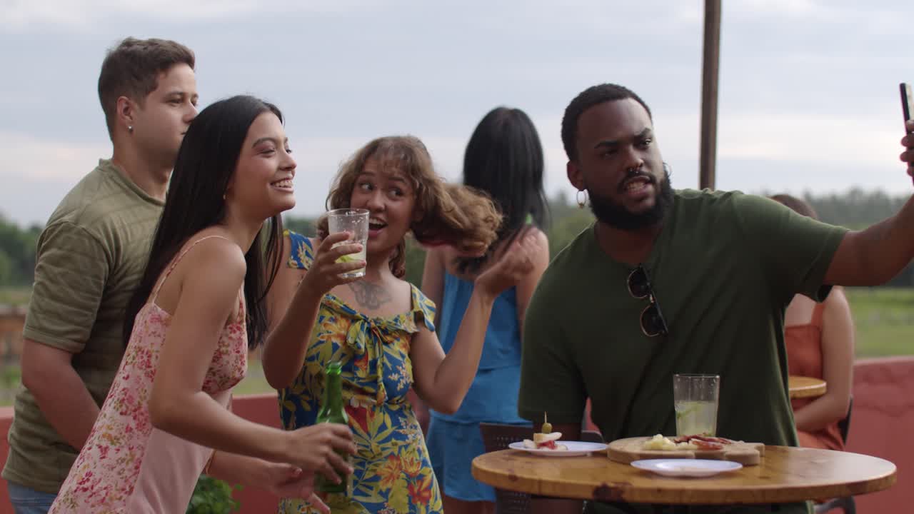 Friends having a fun time at a rooftop party
