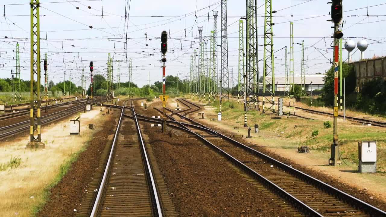 Overhead lines for electric trains from a moving perspective, slow motion.