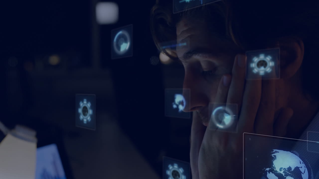 man leaning on cheek at dark technology workspace, analyzing floating gear icons pie charts globe