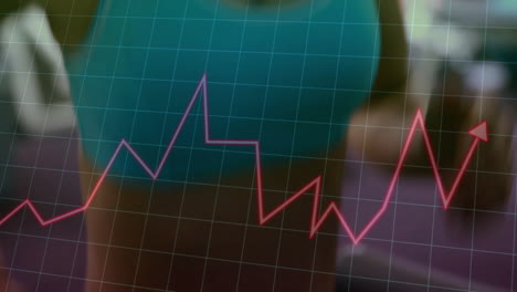 woman showing fitness data in gym, overlaying animated grid with red purple line chart