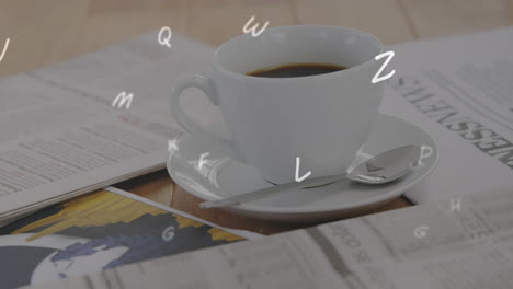 alphabets float above coffee and documents, symbolizing education.