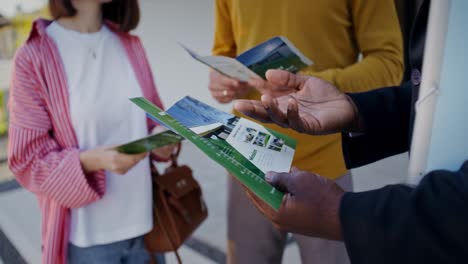real estate agent presenting brochures