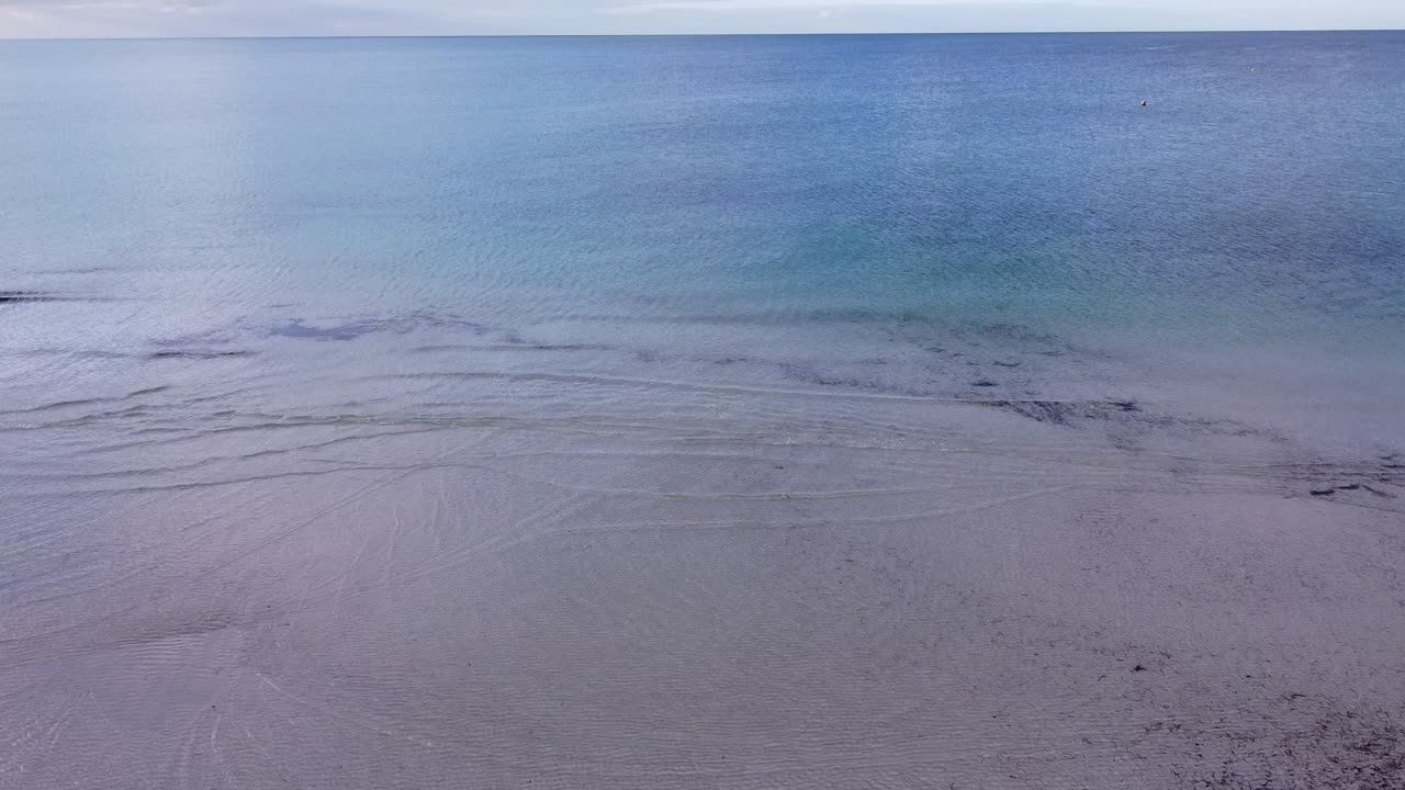 Shallow Waters Of Indian Ocean At Sunset, Busselton Beach - Aerial Tilt Up View
