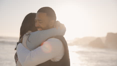 happy, love and couple hug at the beach with care