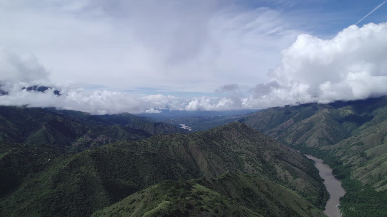 Progressive drone clip showing dramatic mountains with deep river gorges in Amazonas, Costa Rica
