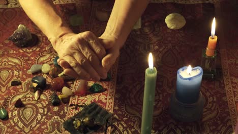 close-up of a medium showing magic crystals for holistic energy rituals