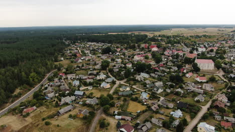 beautiful town of merkine in majestic lithuanian landscape, aerial pan right view