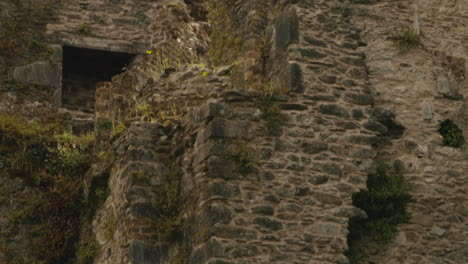 detail of the medieval blarney castle in cork, ireland - tilt up shot