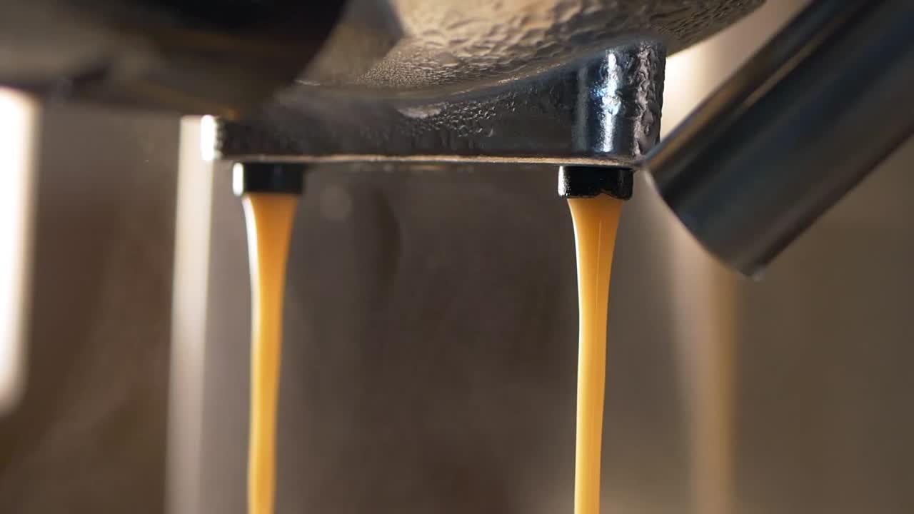 Espresso pouring from a coffee machine