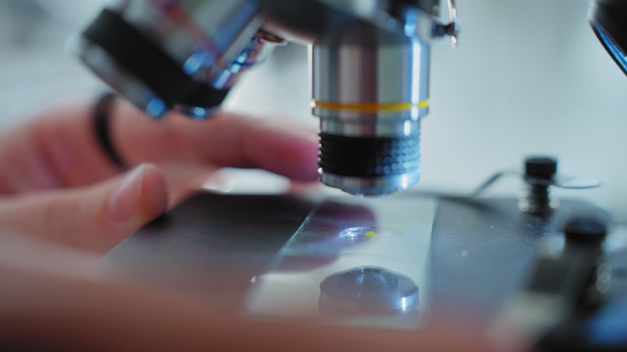 Closeup of Microscope Use