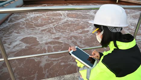 environmental engineers work at wastewater treatment plants