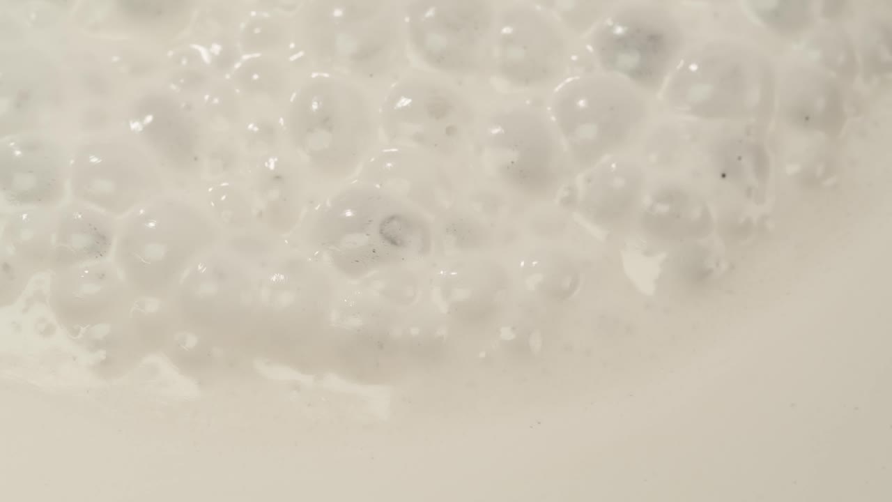 Close-up of White Foam and Bubbles
