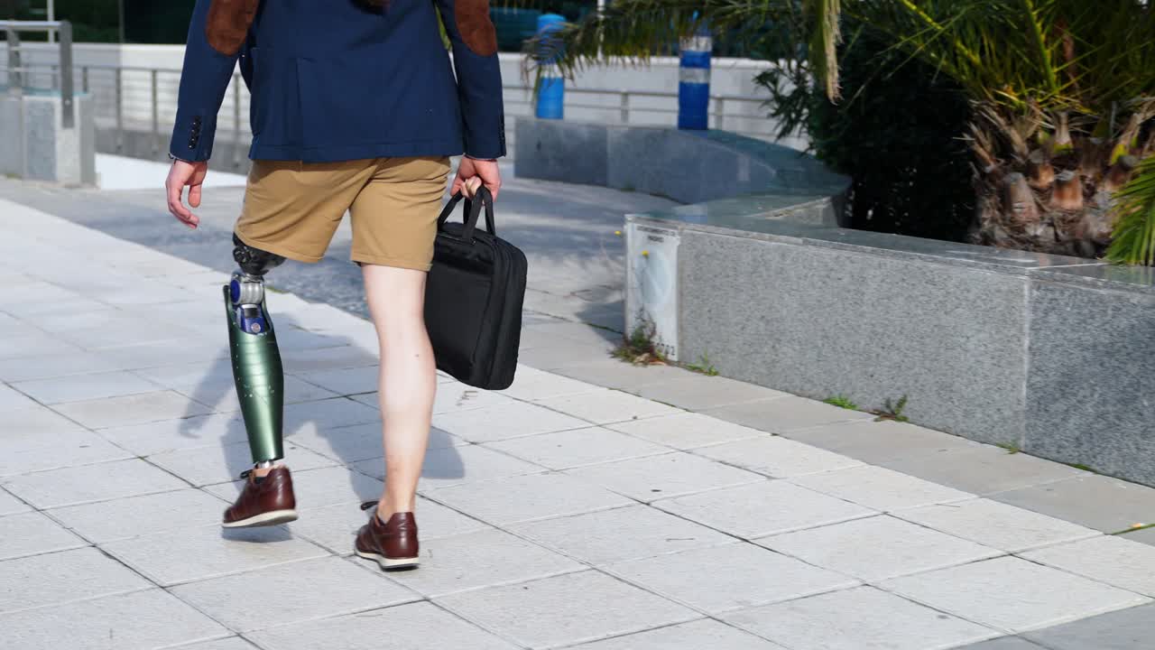 Man with Prosthetic Leg Walking Outdoors