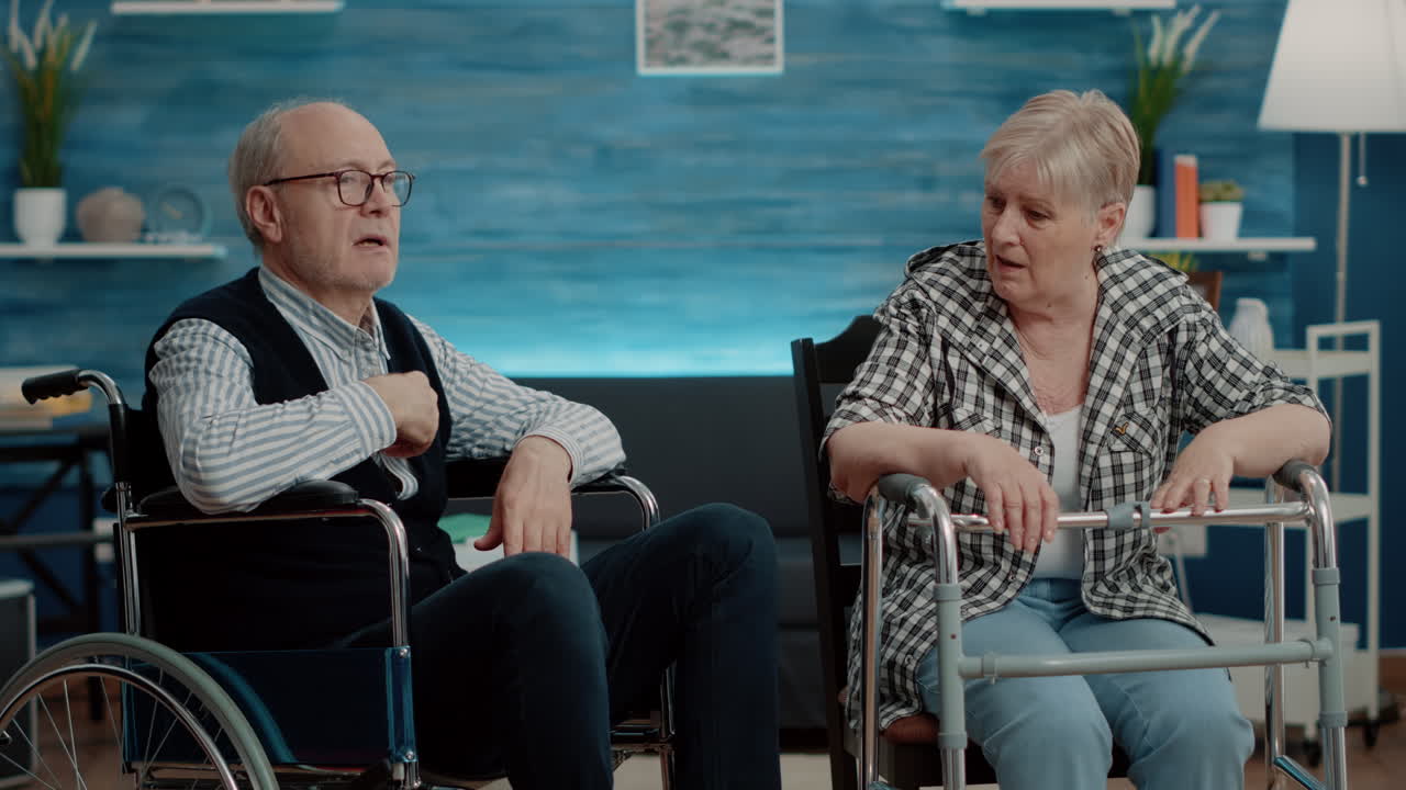 Retired people with ity talking in nursing home