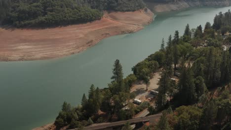 Aerial-view-of-Shasta-Lake-Bridge-in-Northern-California-low-water-levels-during-drought