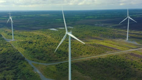 aerial view of wind turbines energy production- 4k aerial shot