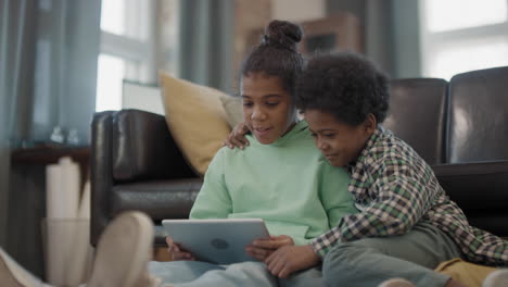 cute afro kids with digital tablet
