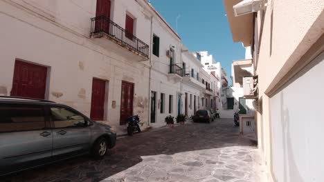 residential street in tinos island in greece in slow motion