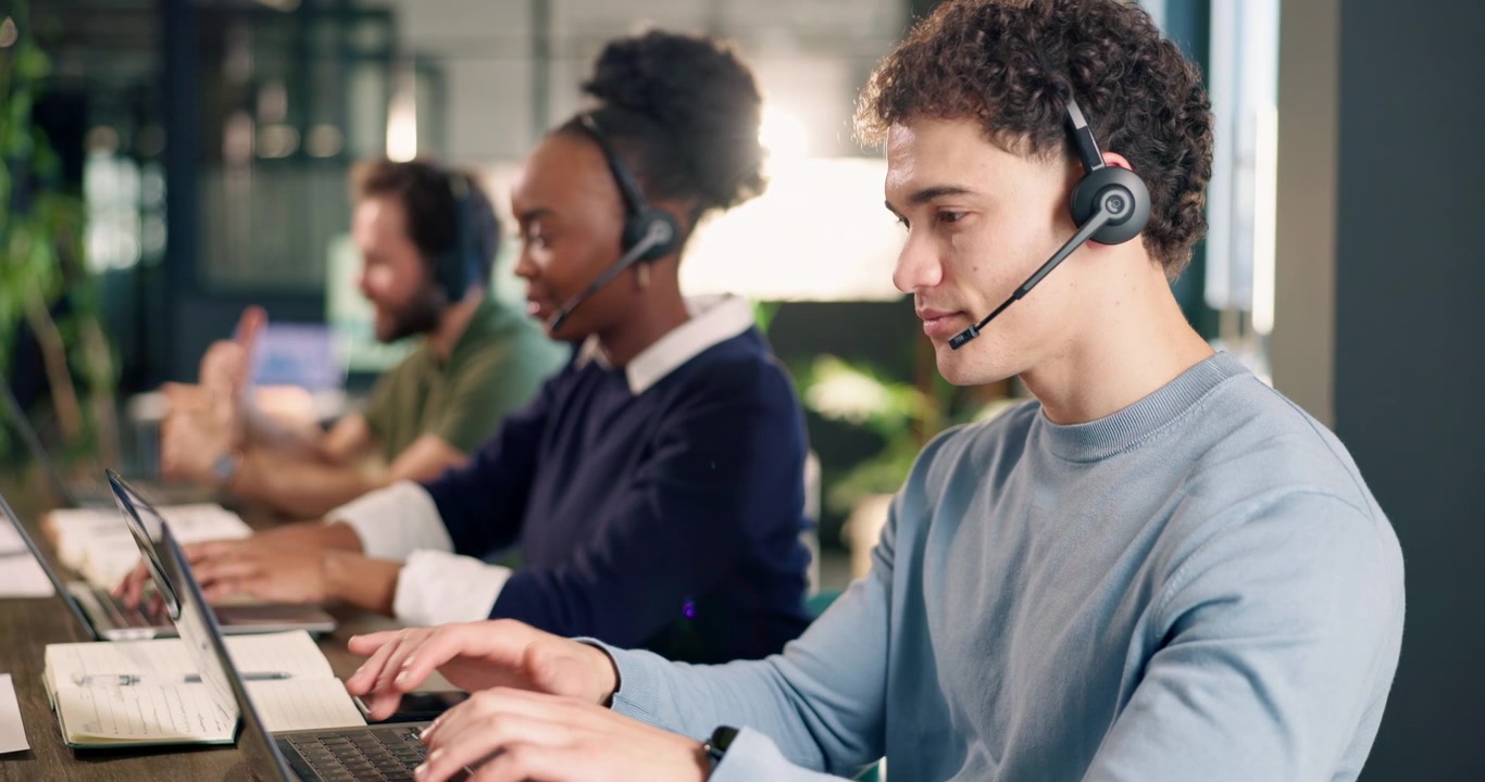 Diverse Team of Customer Support Agents Working in Modern Office