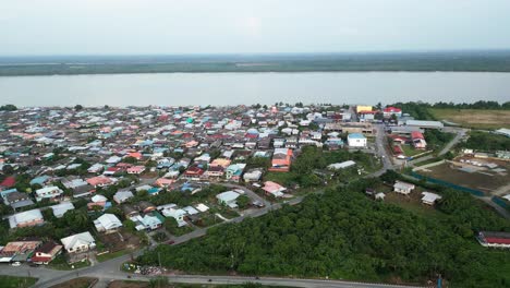 aerial drone view during summer kabong fishing village,with river and beach,sarawak,borneo