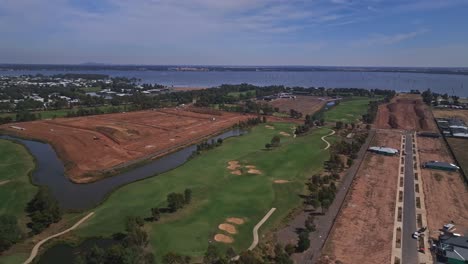 overhead the black bull golf course with new building stages at silverwoods and lake mulwala beyond