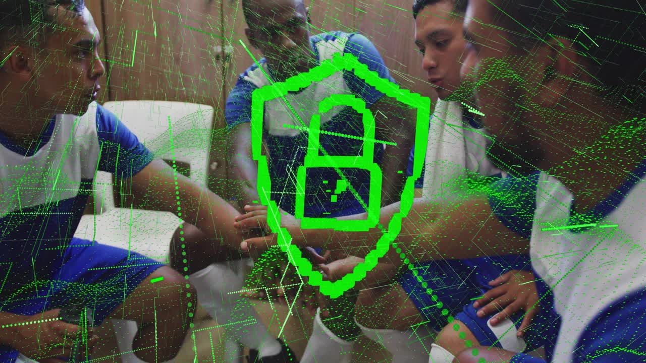 Video vertikal: Empat pemain sepak bola saling meraih tangan dan menginisiasi hamparan perisai hijau, bersorak.