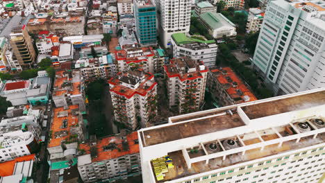 discover the charming allure of ho chi city's vintage apartment buildings in this captivating aerial footage