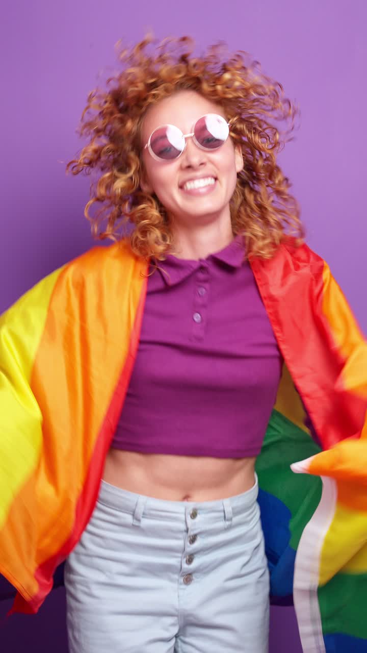 Woman with LGBTQ Pride Flag