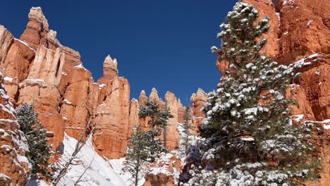 experience a thrilling snowmobile adventure on a breathtaking winter mountain trail experience the exhilarating thrill of unique snowmobiling across breathtaking snowy mountains under clear blue skies