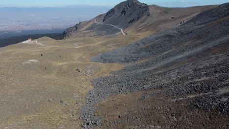 A-cinematic-video-of-a-path-between-the-mountains-in-Toluca,-Mexico